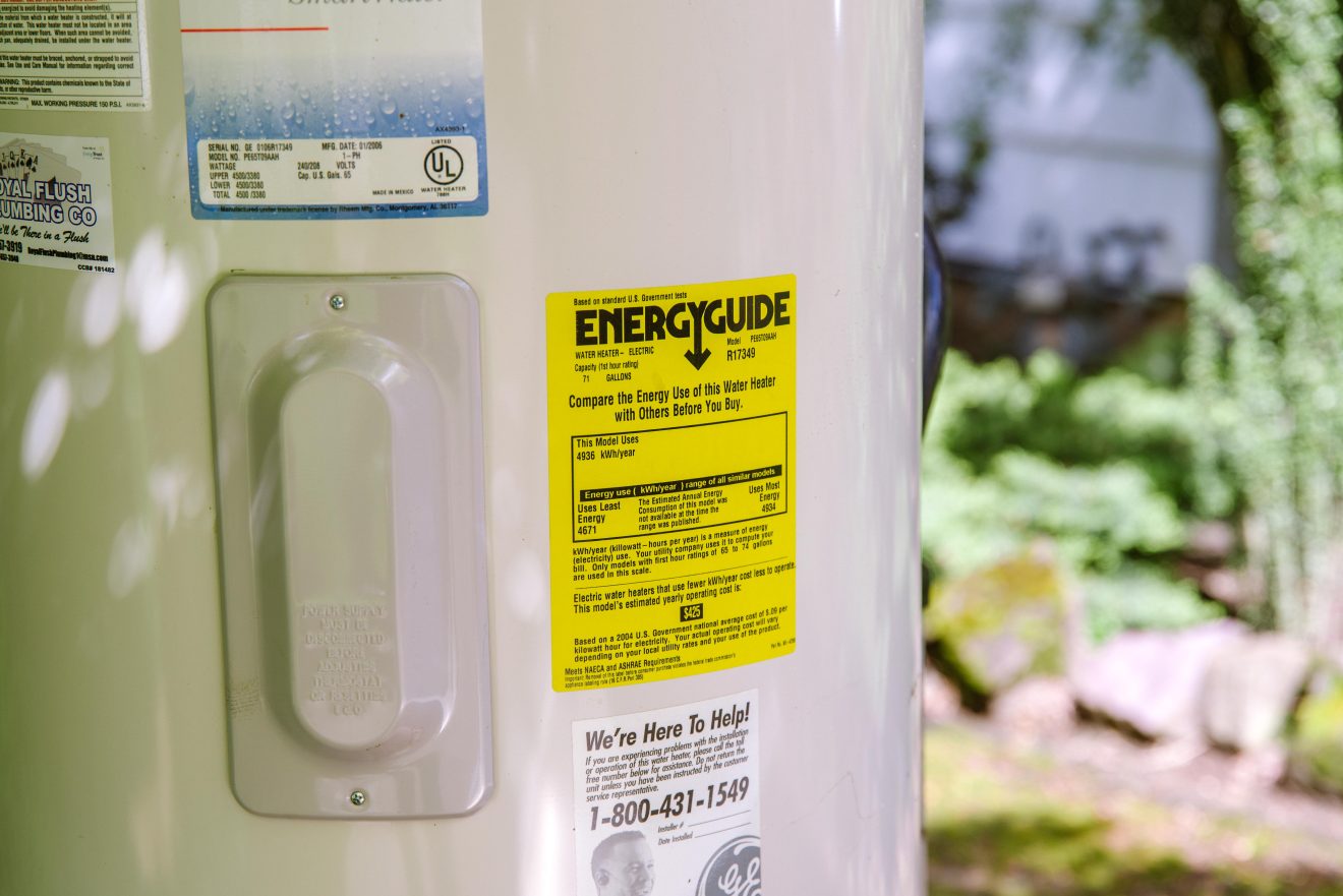 Close-up of labels on a water heater